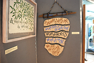 Winter from Clare's Year, and Pattern, banner with driftwood and clay fragments, words by Virginia Woolf.