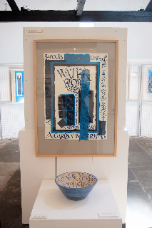 Central cabinet section, including Persian garden with goldfish (paperwork), text by Vita Sackville-West, and The voice of the river (bowl) text by Frances Bingham
