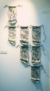 Living water (waterfall banner in clay), text by Vita Sackville-West